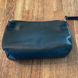 Black Clutch or Wristlet with 3 pockets total, 1 zipper & 2 without all inside
